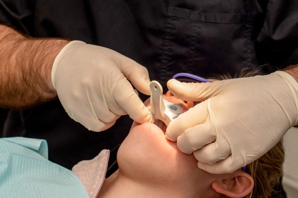 orthodontist making a teeth mold orthodontic treatment